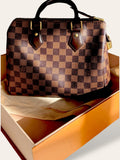 Louis Vuitton Damier Ebene Speedy Bandouliere 25 $980