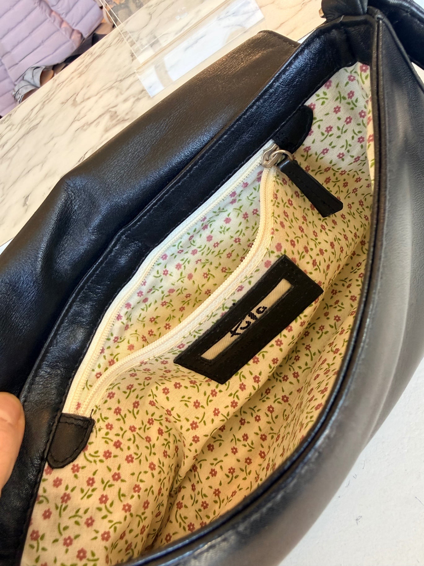Tula black leather shoulder bag